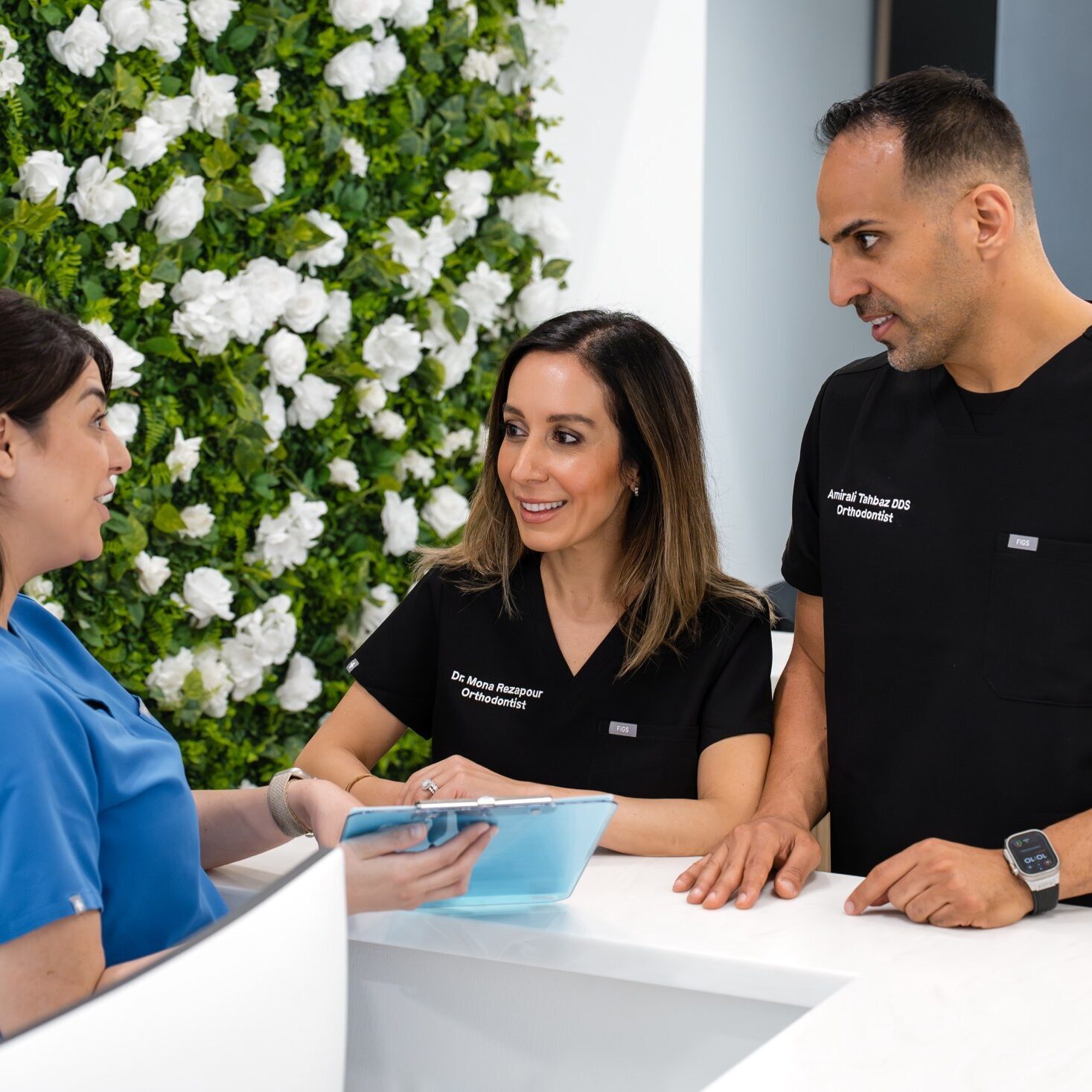 Luv Braces orthodontists reviewing patient treatment plans